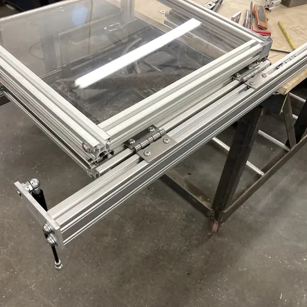 Aluminum-profile guard frame with clear panels being fabricated in the 9EHS shop