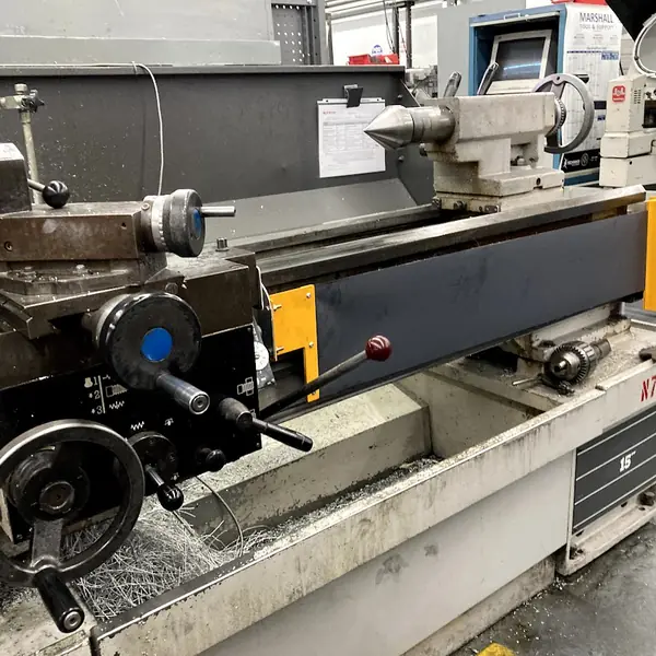 Clausing lathe carriage and leadscrew with a yellow end guard