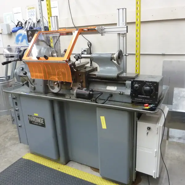 Hardinge lathe fitted with an orange-frame chuck guard