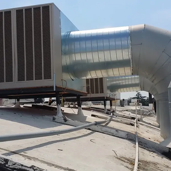 Rooftop air handling unit connected to large galvanized ductwork